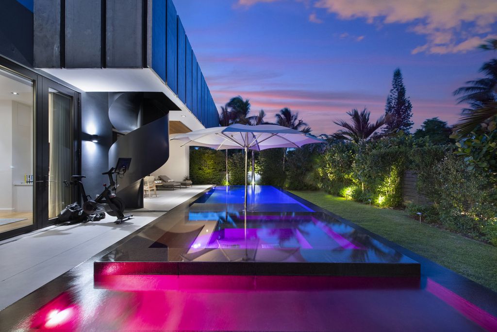 The Villa in Miami Beach, a custom exquisite waterfront home in the prestigious 24H guard gated community Biscayne Pointe offering 60 feet of waterfrontage with new dock is now available for sale. This home located at 8055 Noremac Ave, Miami Beach, Florida