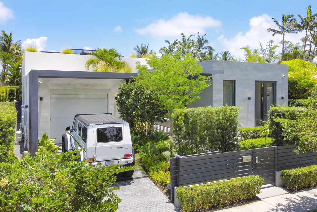The Villa in Miami Beach, a custom exquisite waterfront home in the prestigious 24H guard gated community Biscayne Pointe offering 60 feet of waterfrontage with new dock is now available for sale. This home located at 8055 Noremac Ave, Miami Beach, Florida