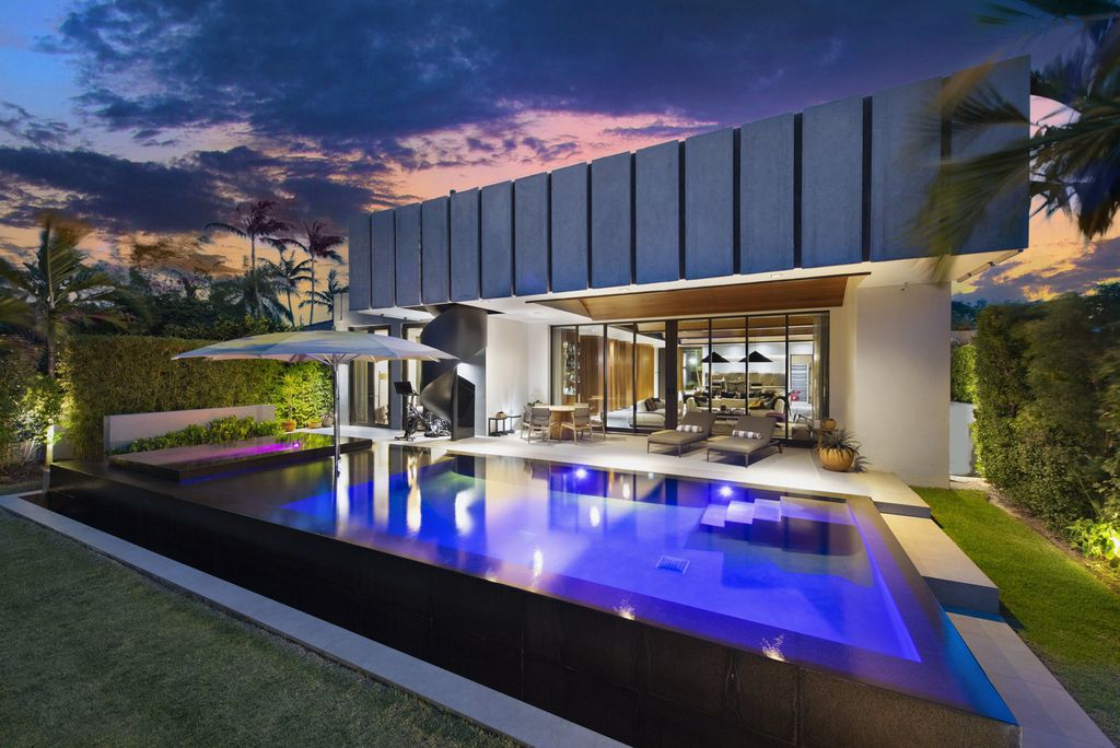 The Villa in Miami Beach, a custom exquisite waterfront home in the prestigious 24H guard gated community Biscayne Pointe offering 60 feet of waterfrontage with new dock is now available for sale. This home located at 8055 Noremac Ave, Miami Beach, Florida