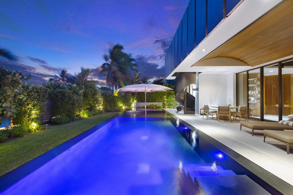 The Villa in Miami Beach, a custom exquisite waterfront home in the prestigious 24H guard gated community Biscayne Pointe offering 60 feet of waterfrontage with new dock is now available for sale. This home located at 8055 Noremac Ave, Miami Beach, Florida