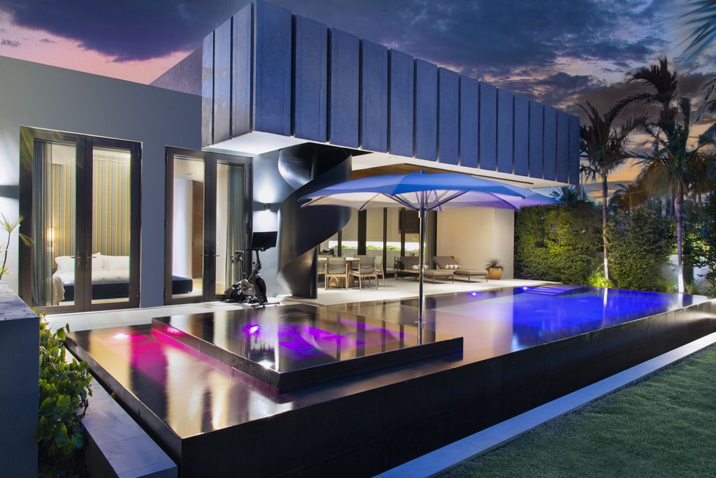 The Villa in Miami Beach, a custom exquisite waterfront home in the prestigious 24H guard gated community Biscayne Pointe offering 60 feet of waterfrontage with new dock is now available for sale. This home located at 8055 Noremac Ave, Miami Beach, Florida
