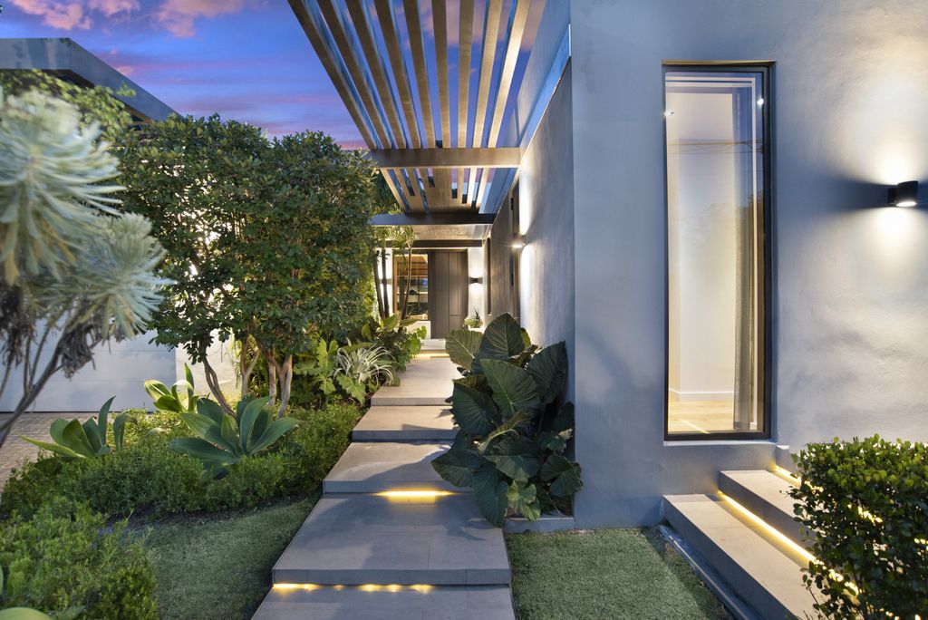 The Villa in Miami Beach, a custom exquisite waterfront home in the prestigious 24H guard gated community Biscayne Pointe offering 60 feet of waterfrontage with new dock is now available for sale. This home located at 8055 Noremac Ave, Miami Beach, Florida