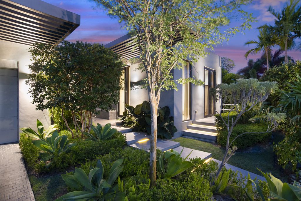 The Villa in Miami Beach, a custom exquisite waterfront home in the prestigious 24H guard gated community Biscayne Pointe offering 60 feet of waterfrontage with new dock is now available for sale. This home located at 8055 Noremac Ave, Miami Beach, Florida