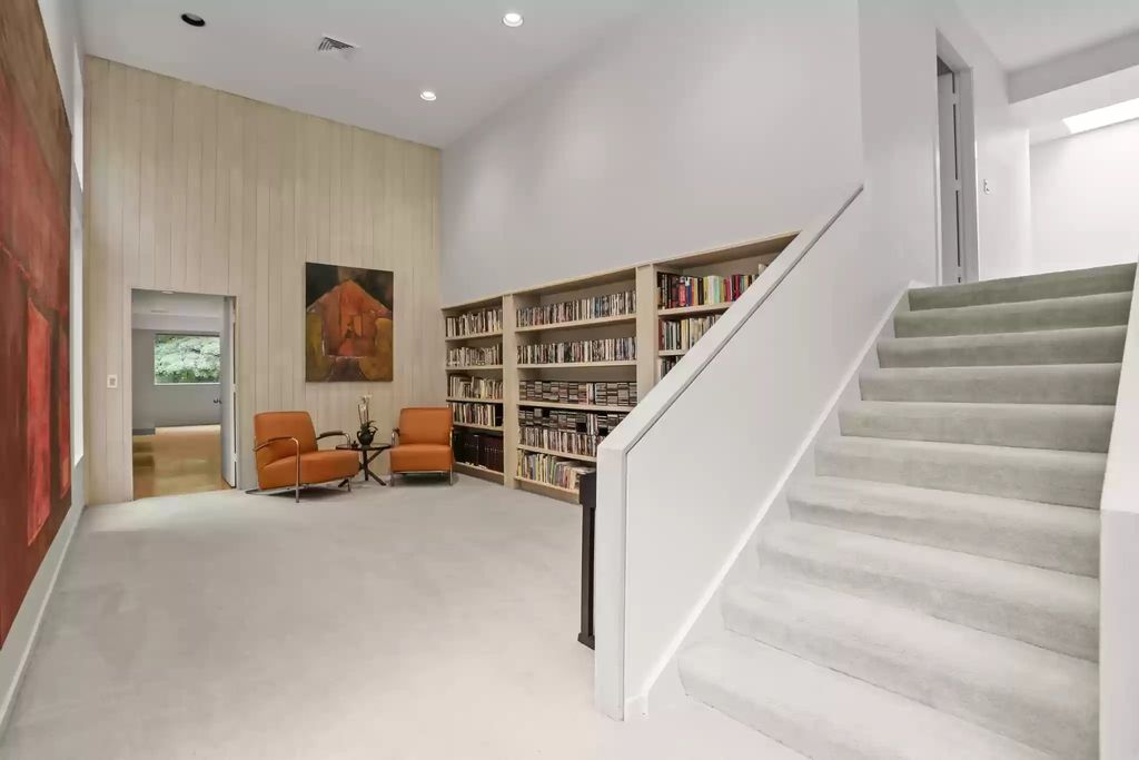 The House in Greenwich blends the verdant outdoors with open living spaces flooded with sunlight, now available for sale. This home located at 48 Lafrentz Rd, Greenwich, Connecticut