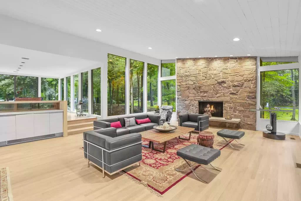 The House in Greenwich blends the verdant outdoors with open living spaces flooded with sunlight, now available for sale. This home located at 48 Lafrentz Rd, Greenwich, Connecticut