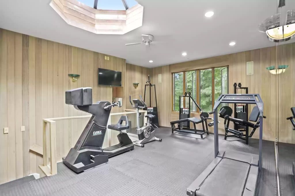 The House in Greenwich blends the verdant outdoors with open living spaces flooded with sunlight, now available for sale. This home located at 48 Lafrentz Rd, Greenwich, Connecticut