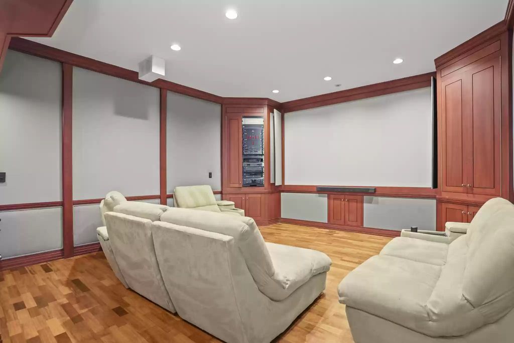 The House in Greenwich blends the verdant outdoors with open living spaces flooded with sunlight, now available for sale. This home located at 48 Lafrentz Rd, Greenwich, Connecticut