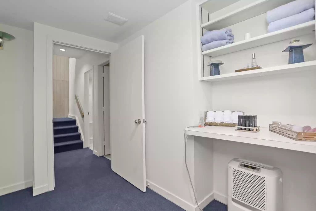 The House in Greenwich blends the verdant outdoors with open living spaces flooded with sunlight, now available for sale. This home located at 48 Lafrentz Rd, Greenwich, Connecticut