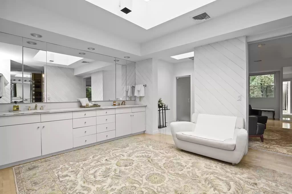 The House in Greenwich blends the verdant outdoors with open living spaces flooded with sunlight, now available for sale. This home located at 48 Lafrentz Rd, Greenwich, Connecticut