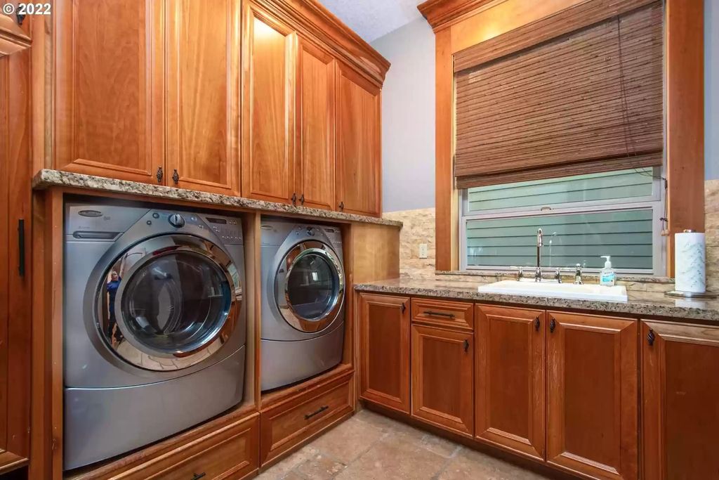 The Estate in Camas is a luxurious home featuring large rooms perfect for entertaining and comfortable living now available for sale. This home located at 636 NW Valley St, Camas, Washington; offering 04 bedrooms and 06 bathrooms with 8,112 square feet of living spaces.