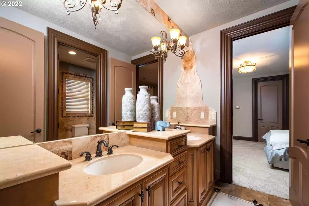 The Estate in Camas is a luxurious home featuring large rooms perfect for entertaining and comfortable living now available for sale. This home located at 636 NW Valley St, Camas, Washington; offering 04 bedrooms and 06 bathrooms with 8,112 square feet of living spaces.