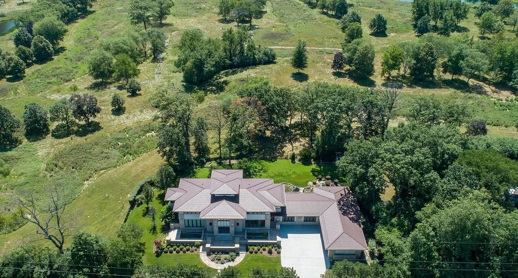 The Estate in Northbrook is a luxurious home featuring dualing staircase, large home office, indoor pool, home theatre, massive kitchen and much more appeal now available for sale. This home located at 925 Morrison Ln, Northbrook, Illinois, offering 06 bedrooms and 08 bathrooms with 8,960 square feet of living spaces. 