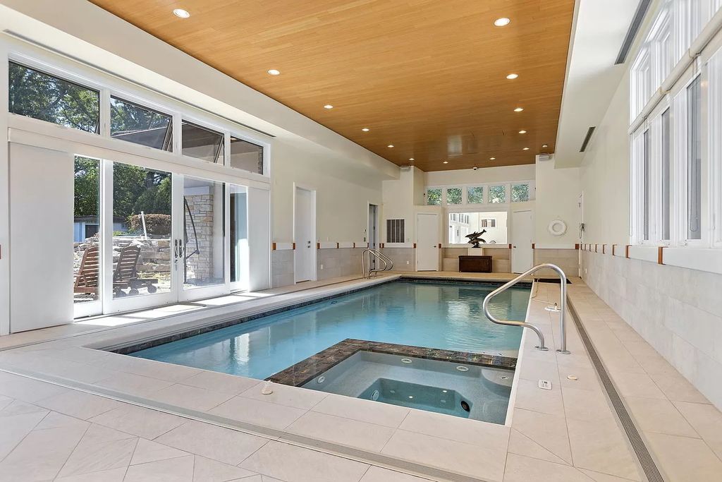 The Estate in Northbrook is a luxurious home featuring dualing staircase, large home office, indoor pool, home theatre, massive kitchen and much more appeal now available for sale. This home located at 925 Morrison Ln, Northbrook, Illinois, offering 06 bedrooms and 08 bathrooms with 8,960 square feet of living spaces. 