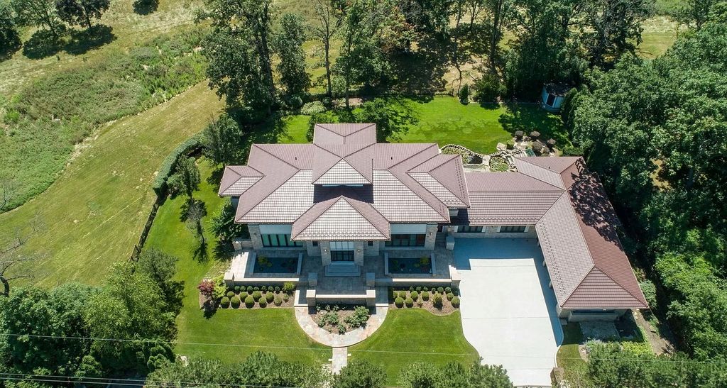 The Estate in Northbrook is a luxurious home featuring dualing staircase, large home office, indoor pool, home theatre, massive kitchen and much more appeal now available for sale. This home located at 925 Morrison Ln, Northbrook, Illinois, offering 06 bedrooms and 08 bathrooms with 8,960 square feet of living spaces. 