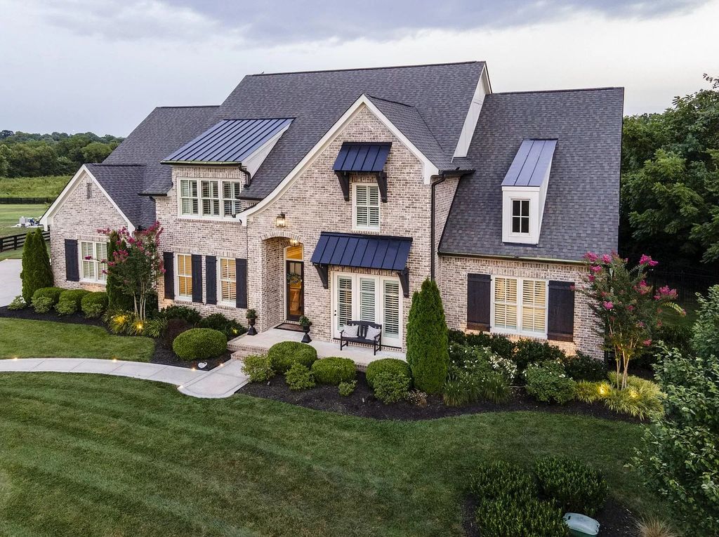 The Estate in Franklin is a luxurious home nestled on a peaceful 1.03 acre lot with custom gardens, fully fenced backyard and irrigation now available for sale. This home located at 1045 Buena Vista Dr, Franklin, Tennessee; offering 05 bedrooms and 07 bathrooms with 5,391 square feet of living spaces.