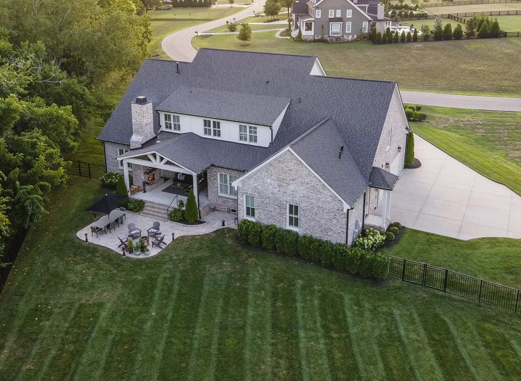 The Estate in Franklin is a luxurious home nestled on a peaceful 1.03 acre lot with custom gardens, fully fenced backyard and irrigation now available for sale. This home located at 1045 Buena Vista Dr, Franklin, Tennessee; offering 05 bedrooms and 07 bathrooms with 5,391 square feet of living spaces.