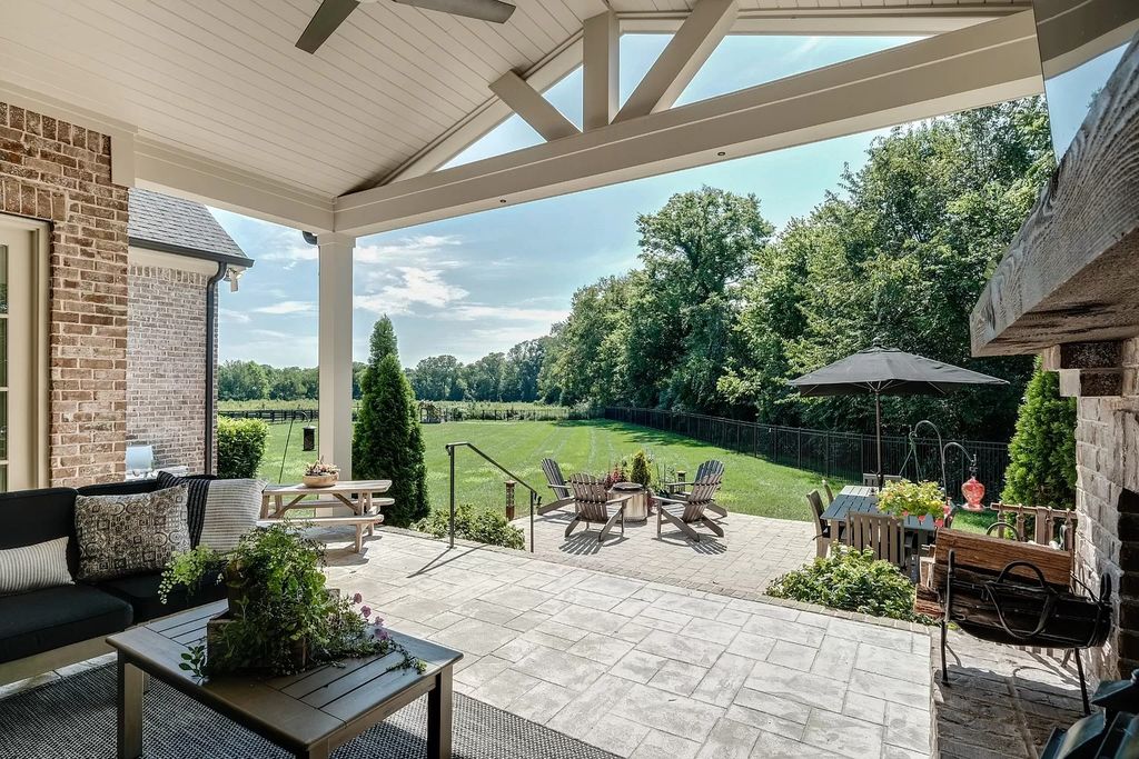 The Estate in Franklin is a luxurious home nestled on a peaceful 1.03 acre lot with custom gardens, fully fenced backyard and irrigation now available for sale. This home located at 1045 Buena Vista Dr, Franklin, Tennessee; offering 05 bedrooms and 07 bathrooms with 5,391 square feet of living spaces.