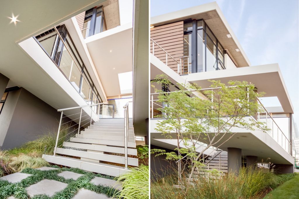 Spread across three different levels, a central courtyard that flows into the rear garden and sparkling recessed lighting put the final touches on a South African home where outdoor living takes precedence.