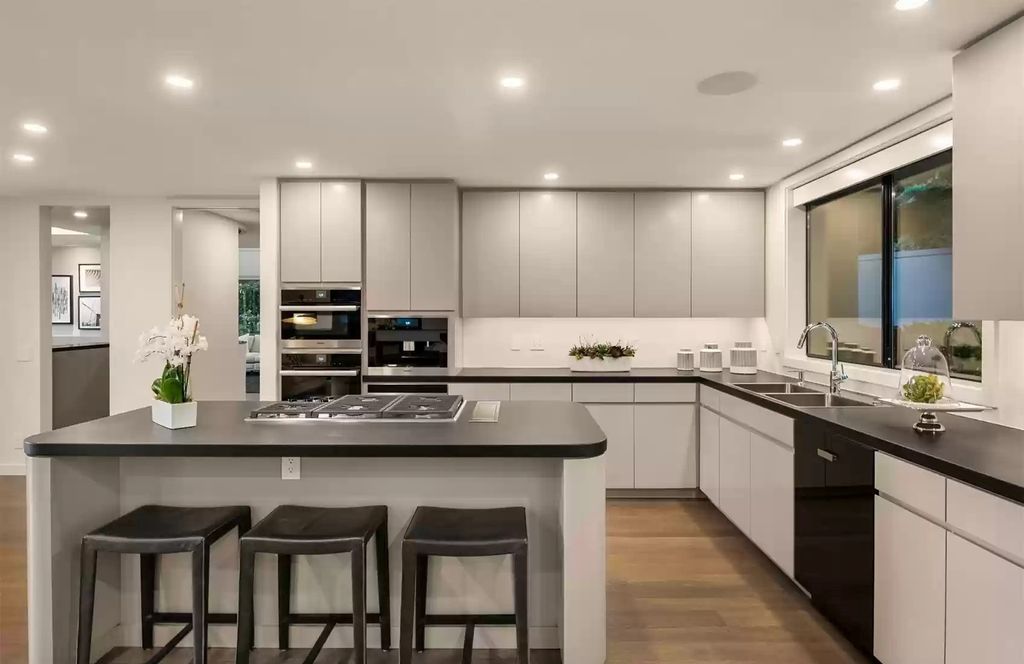 The Home in Medina is an impeccably stylish and undeniably chic home with effortless entertaining spaces, now available for sale. This home located at 7329 NE 18th Street, Medina, Washington