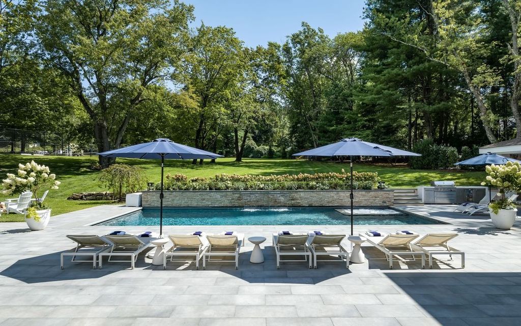 The Home in Greenwich is designed for seamless indoor/outdoor entertaining with resort-style amenities, now available for sale. This home located at 7 Dwight Ln, Greenwich, Connecticut