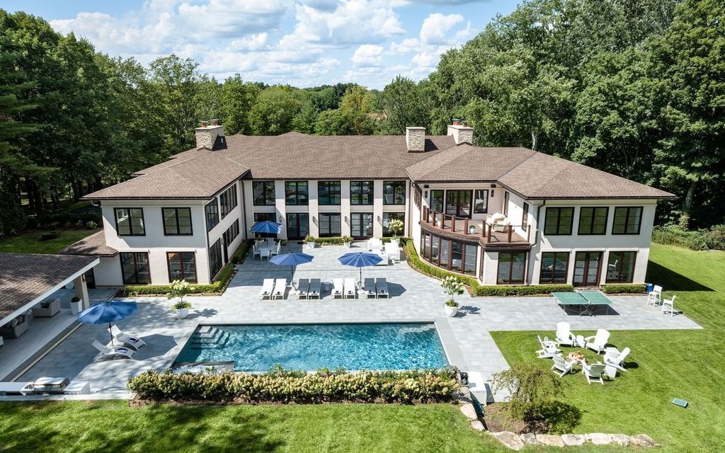The Home in Greenwich is designed for seamless indoor/outdoor entertaining with resort-style amenities, now available for sale. This home located at 7 Dwight Ln, Greenwich, Connecticut