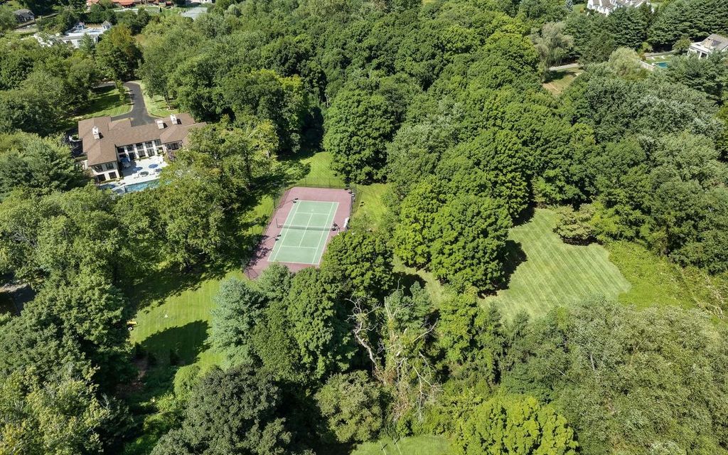The Home in Greenwich is designed for seamless indoor/outdoor entertaining with resort-style amenities, now available for sale. This home located at 7 Dwight Ln, Greenwich, Connecticut