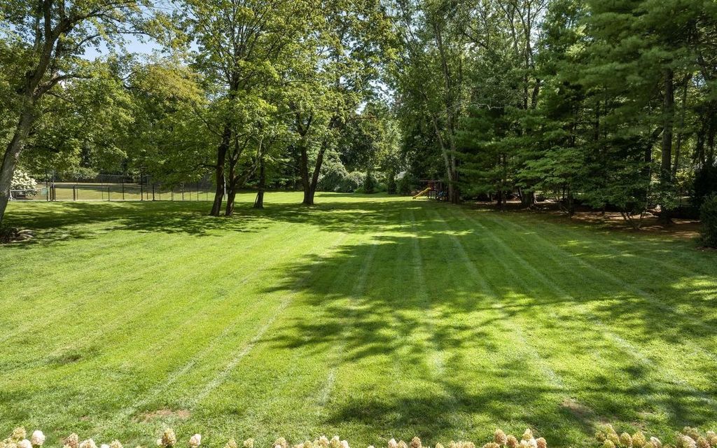 The Home in Greenwich is designed for seamless indoor/outdoor entertaining with resort-style amenities, now available for sale. This home located at 7 Dwight Ln, Greenwich, Connecticut