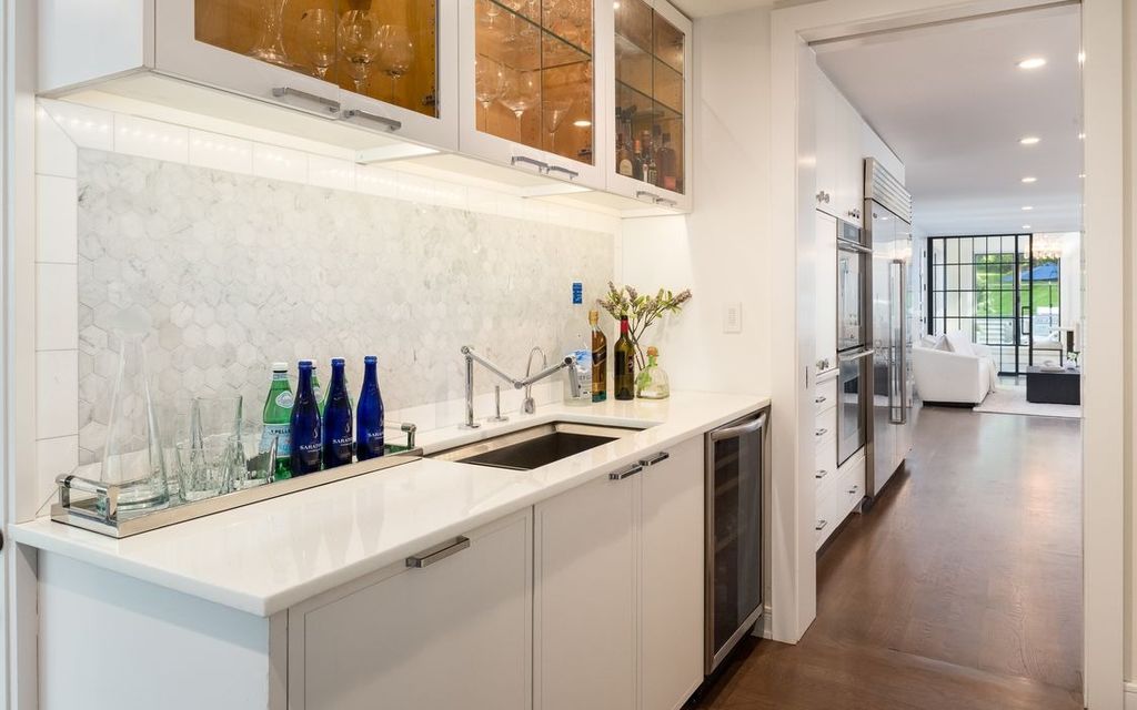 The Home in Greenwich is designed for seamless indoor/outdoor entertaining with resort-style amenities, now available for sale. This home located at 7 Dwight Ln, Greenwich, Connecticut