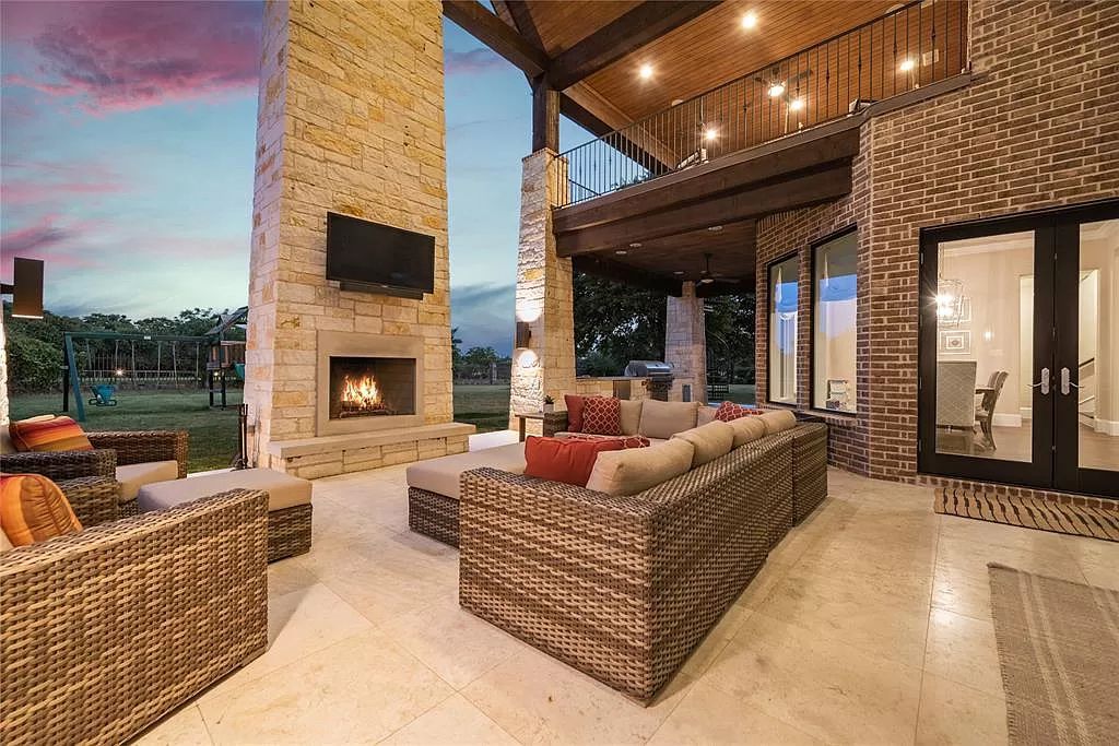 The Home in Flower Mound, a prominent 2 acre estate nestled in the gated and guarded neighborhood of Chateau de lac offering an impressive outdoor living and a picturesque entryway is now available for sale. This house located at 1901 Genevieve Ct, Flower Mound, Texas