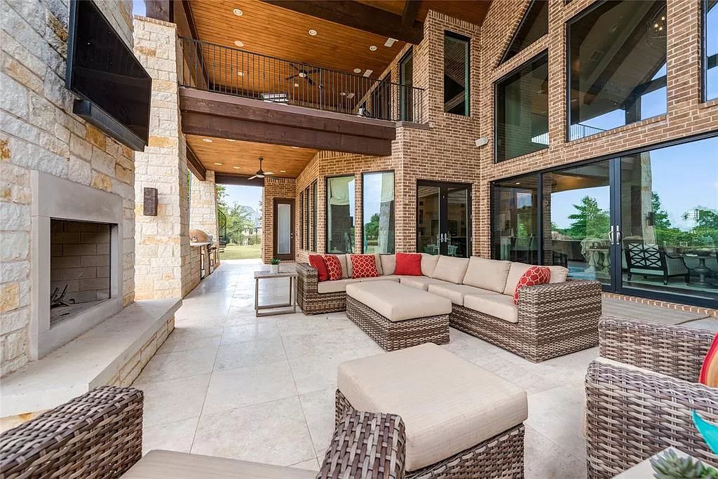 The Home in Flower Mound, a prominent 2 acre estate nestled in the gated and guarded neighborhood of Chateau de lac offering an impressive outdoor living and a picturesque entryway is now available for sale. This house located at 1901 Genevieve Ct, Flower Mound, Texas