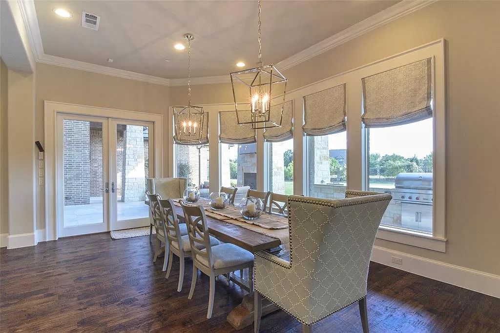 The Home in Flower Mound, a prominent 2 acre estate nestled in the gated and guarded neighborhood of Chateau de lac offering an impressive outdoor living and a picturesque entryway is now available for sale. This house located at 1901 Genevieve Ct, Flower Mound, Texas