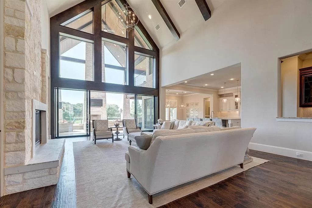 The Home in Flower Mound, a prominent 2 acre estate nestled in the gated and guarded neighborhood of Chateau de lac offering an impressive outdoor living and a picturesque entryway is now available for sale. This house located at 1901 Genevieve Ct, Flower Mound, Texas