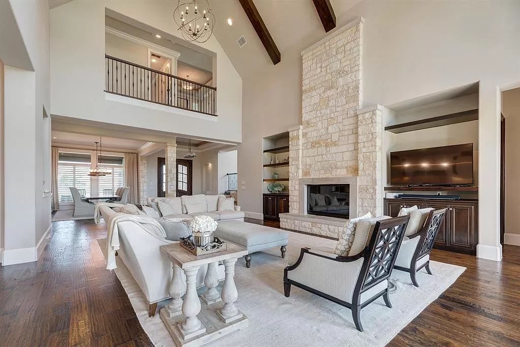 The Home in Flower Mound, a prominent 2 acre estate nestled in the gated and guarded neighborhood of Chateau de lac offering an impressive outdoor living and a picturesque entryway is now available for sale. This house located at 1901 Genevieve Ct, Flower Mound, Texas