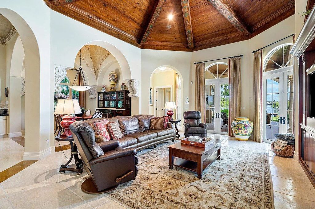 The Property in Jupiter, a magnificent Mediterranean inspired home with incredible water views, custom inlays of all ceilings, and an inviting well thought out floor plan is now available for sale. This home located at 317 Old Jupiter Beach Rd, Jupiter, Florida
