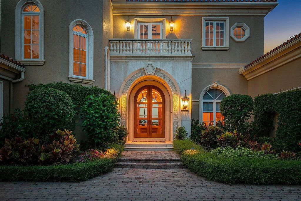 The Property in Jupiter, a magnificent Mediterranean inspired home with incredible water views, custom inlays of all ceilings, and an inviting well thought out floor plan is now available for sale. This home located at 317 Old Jupiter Beach Rd, Jupiter, Florida