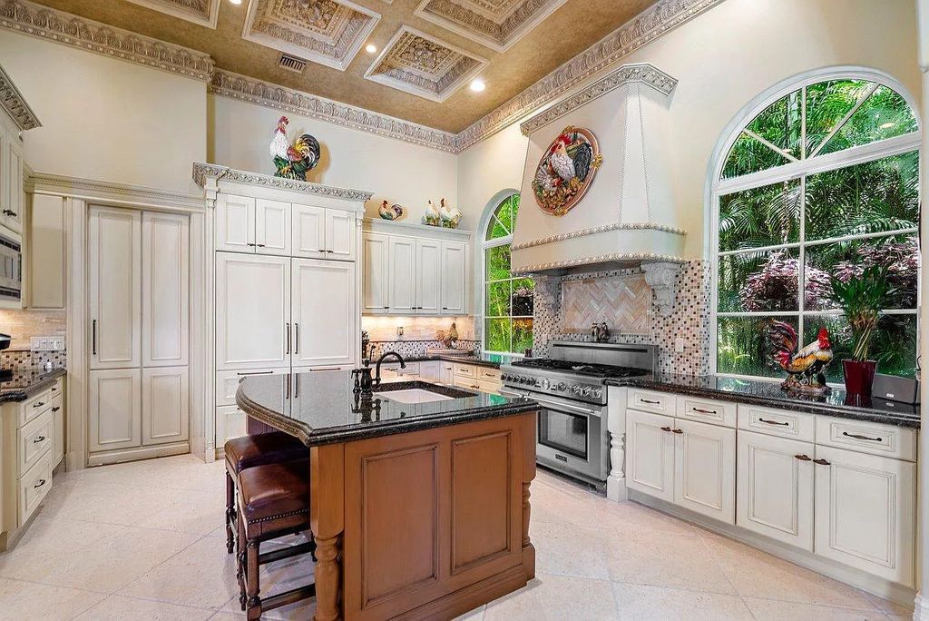 The Property in Jupiter, a magnificent Mediterranean inspired home with incredible water views, custom inlays of all ceilings, and an inviting well thought out floor plan is now available for sale. This home located at 317 Old Jupiter Beach Rd, Jupiter, Florida
