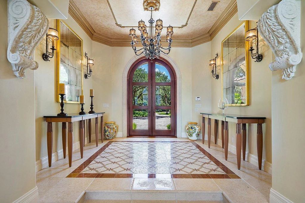 The Property in Jupiter, a magnificent Mediterranean inspired home with incredible water views, custom inlays of all ceilings, and an inviting well thought out floor plan is now available for sale. This home located at 317 Old Jupiter Beach Rd, Jupiter, Florida
