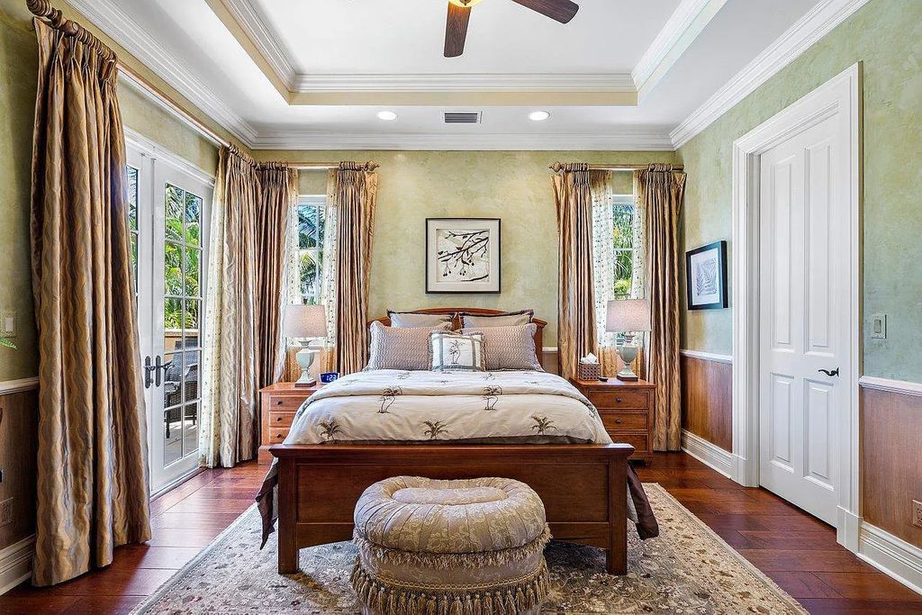 The Property in Jupiter, a magnificent Mediterranean inspired home with incredible water views, custom inlays of all ceilings, and an inviting well thought out floor plan is now available for sale. This home located at 317 Old Jupiter Beach Rd, Jupiter, Florida