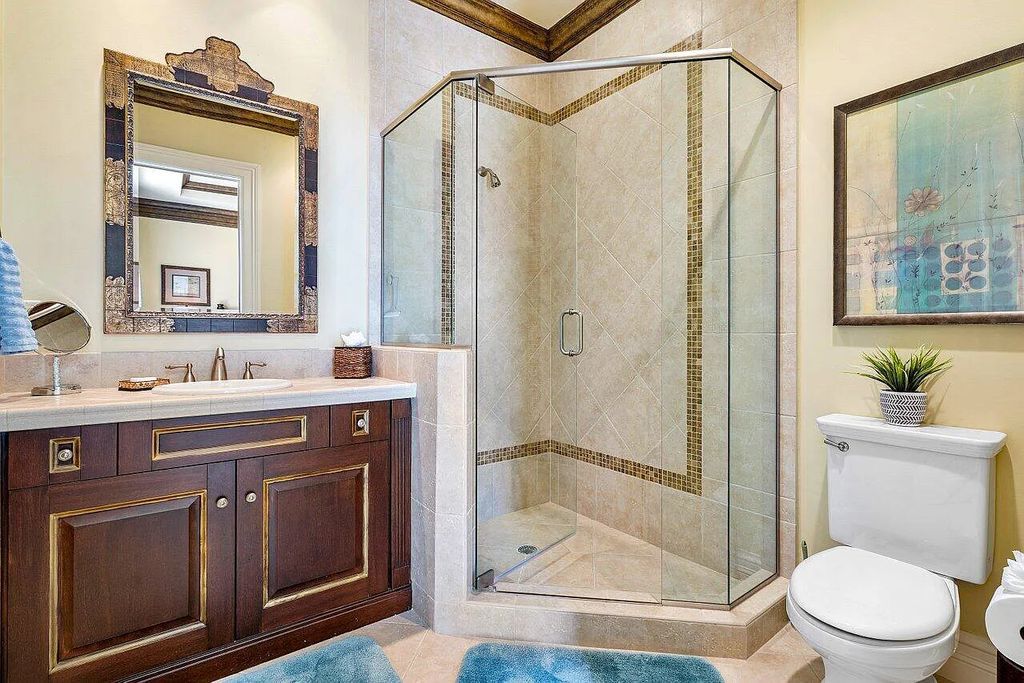 The Property in Jupiter, a magnificent Mediterranean inspired home with incredible water views, custom inlays of all ceilings, and an inviting well thought out floor plan is now available for sale. This home located at 317 Old Jupiter Beach Rd, Jupiter, Florida