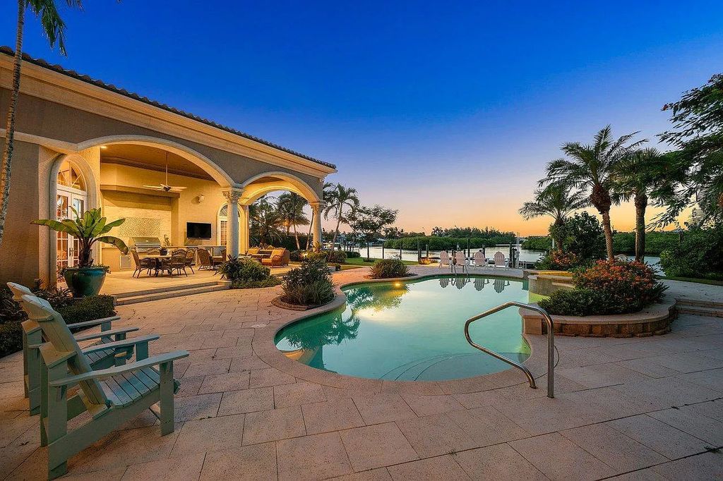 The Property in Jupiter, a magnificent Mediterranean inspired home with incredible water views, custom inlays of all ceilings, and an inviting well thought out floor plan is now available for sale. This home located at 317 Old Jupiter Beach Rd, Jupiter, Florida