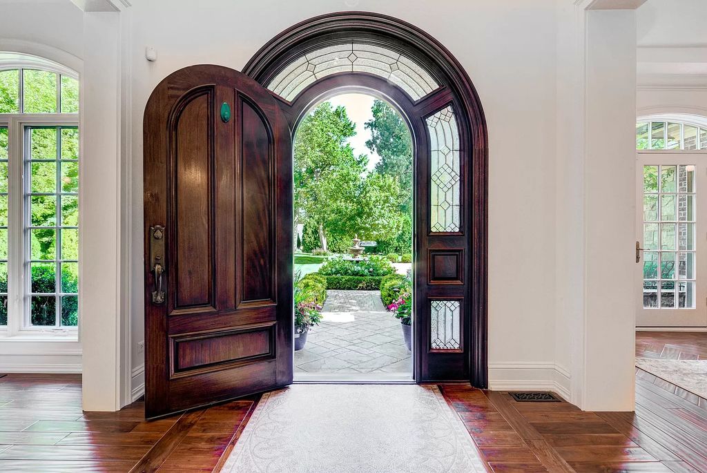 The Home in Winnetka is surrounded with picturesque perennial flower and organic vegetable gardens, lush grounds, now available for sale. This home located at 102 Longmeadow Rd, Winnetka, Illinois