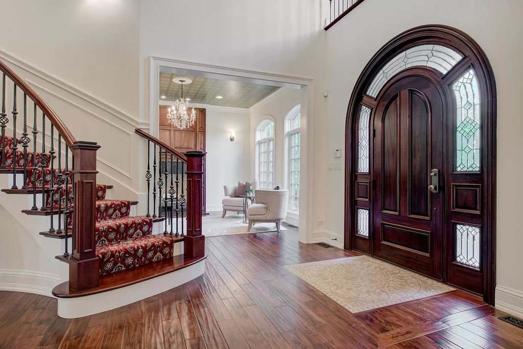 The Home in Winnetka is surrounded with picturesque perennial flower and organic vegetable gardens, lush grounds, now available for sale. This home located at 102 Longmeadow Rd, Winnetka, Illinois