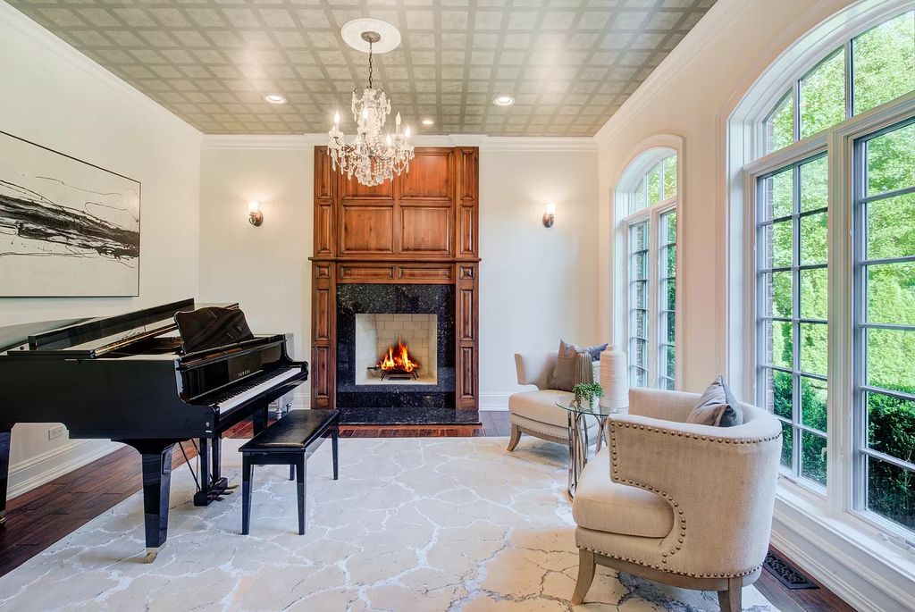 The Home in Winnetka is surrounded with picturesque perennial flower and organic vegetable gardens, lush grounds, now available for sale. This home located at 102 Longmeadow Rd, Winnetka, Illinois