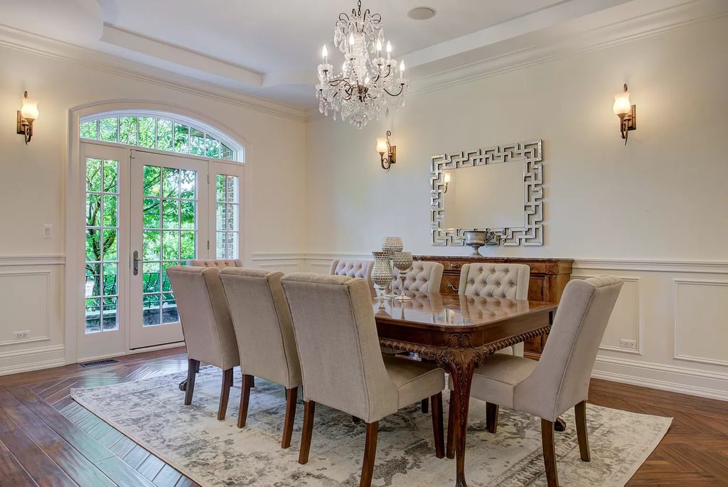 The Home in Winnetka is surrounded with picturesque perennial flower and organic vegetable gardens, lush grounds, now available for sale. This home located at 102 Longmeadow Rd, Winnetka, Illinois
