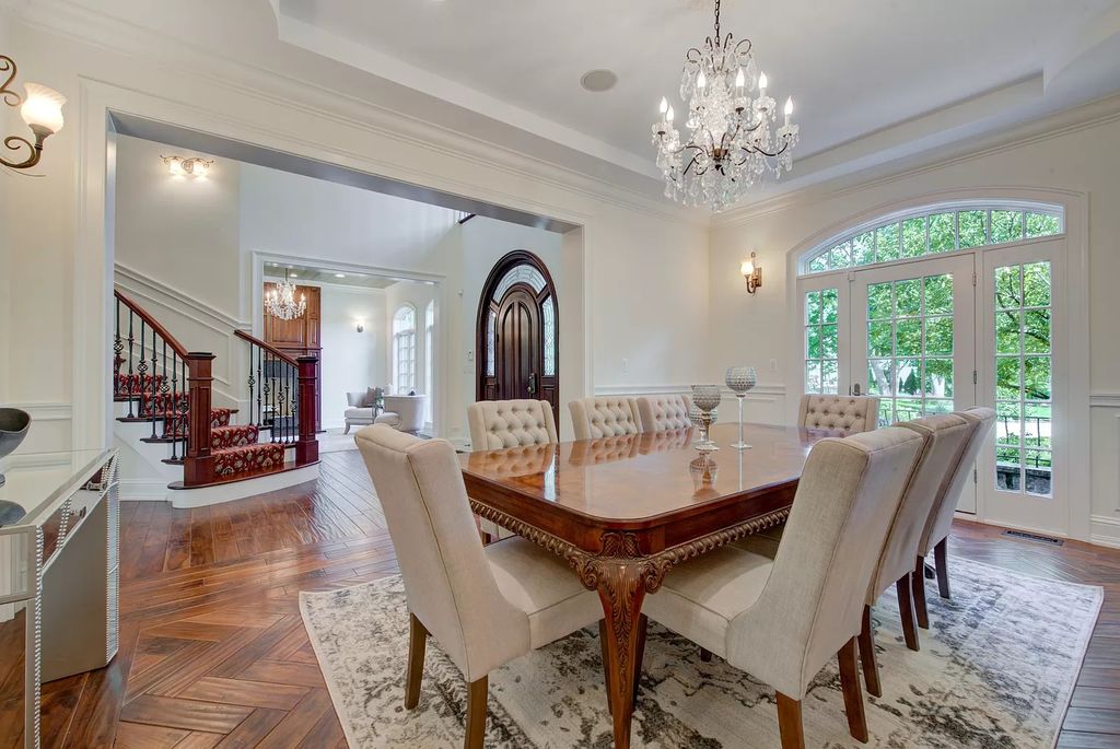The Home in Winnetka is surrounded with picturesque perennial flower and organic vegetable gardens, lush grounds, now available for sale. This home located at 102 Longmeadow Rd, Winnetka, Illinois