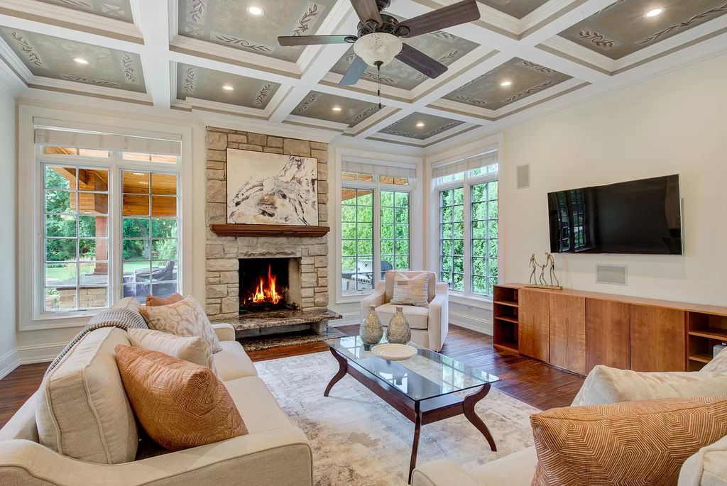 The Home in Winnetka is surrounded with picturesque perennial flower and organic vegetable gardens, lush grounds, now available for sale. This home located at 102 Longmeadow Rd, Winnetka, Illinois