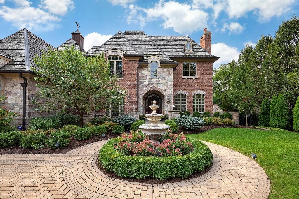 The Home in Winnetka is surrounded with picturesque perennial flower and organic vegetable gardens, lush grounds, now available for sale. This home located at 102 Longmeadow Rd, Winnetka, Illinois