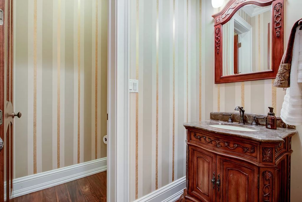 The Home in Winnetka is surrounded with picturesque perennial flower and organic vegetable gardens, lush grounds, now available for sale. This home located at 102 Longmeadow Rd, Winnetka, Illinois