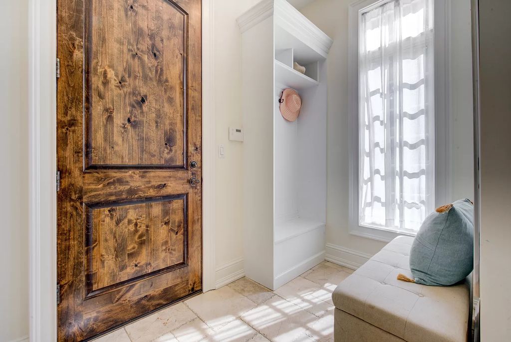 The Home in Winnetka is surrounded with picturesque perennial flower and organic vegetable gardens, lush grounds, now available for sale. This home located at 102 Longmeadow Rd, Winnetka, Illinois