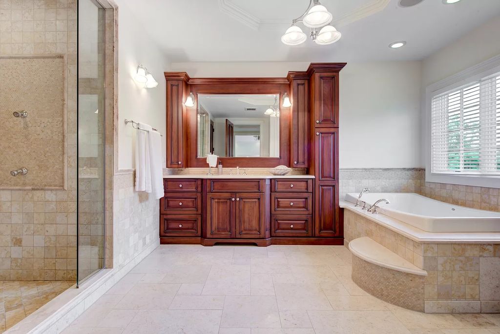 The Home in Winnetka is surrounded with picturesque perennial flower and organic vegetable gardens, lush grounds, now available for sale. This home located at 102 Longmeadow Rd, Winnetka, Illinois